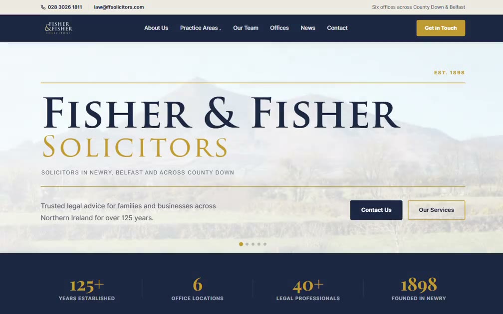 The Fisher & Fisher Solicitors website on a laptop, designed and built by Donard Digital